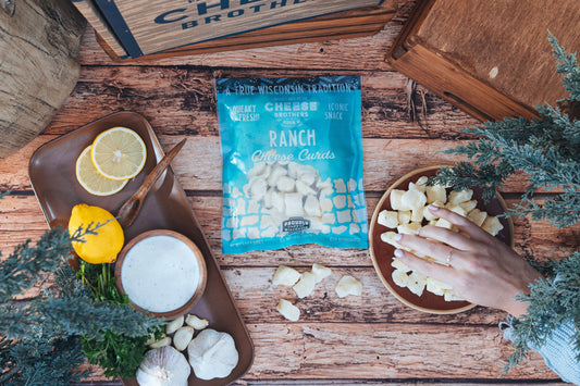 Fresh Ranch Cheese Curds from Cheese Brothers, Inc., showing a close-up of creamy cheese curds in a pack.