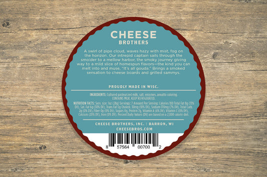Slice of smoked Gouda cheese from Cheese Brothers, Inc., showcasing its rich, smoky flavor and smooth, yellow-orange appearance.