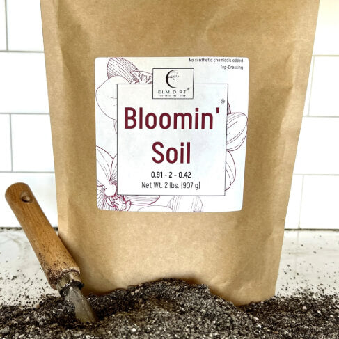 Elm Dirt Bloomin' Soil organic flower booster bag, 2 lbs, enhances blooms for larger, longer-lasting flowers in your garden.