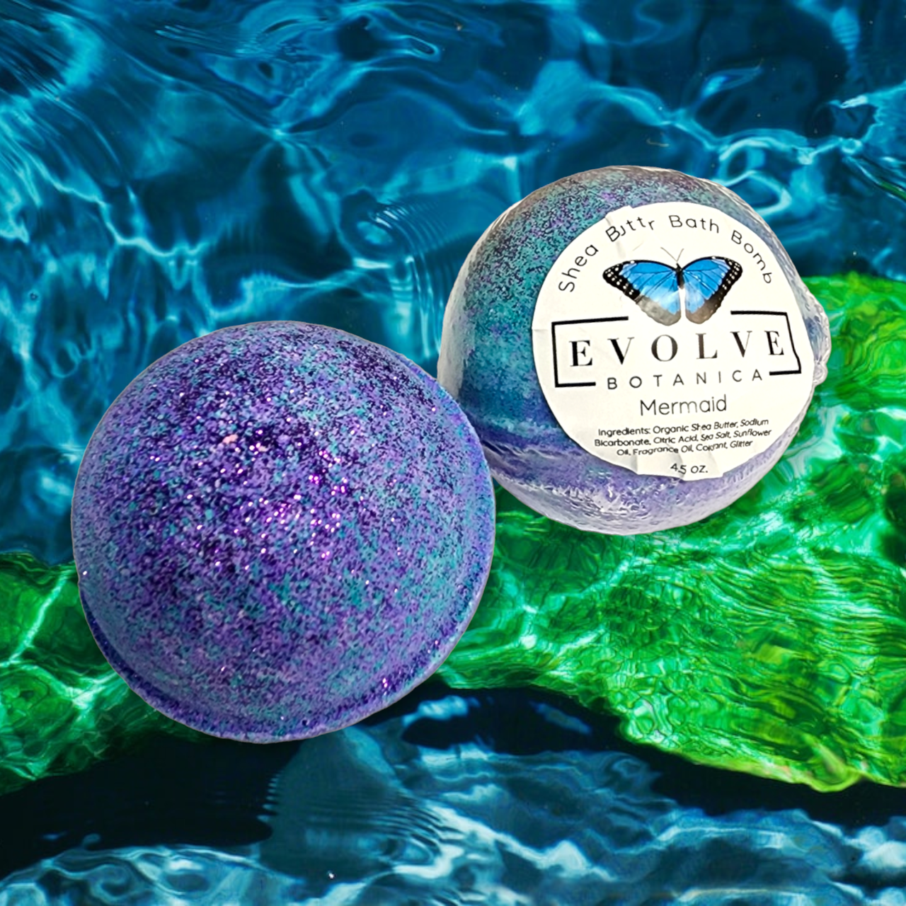 Evolve Botanica Mermaid Bath Bomb with vibrant colors and ocean-inspired design, perfect for a relaxing bath experience.