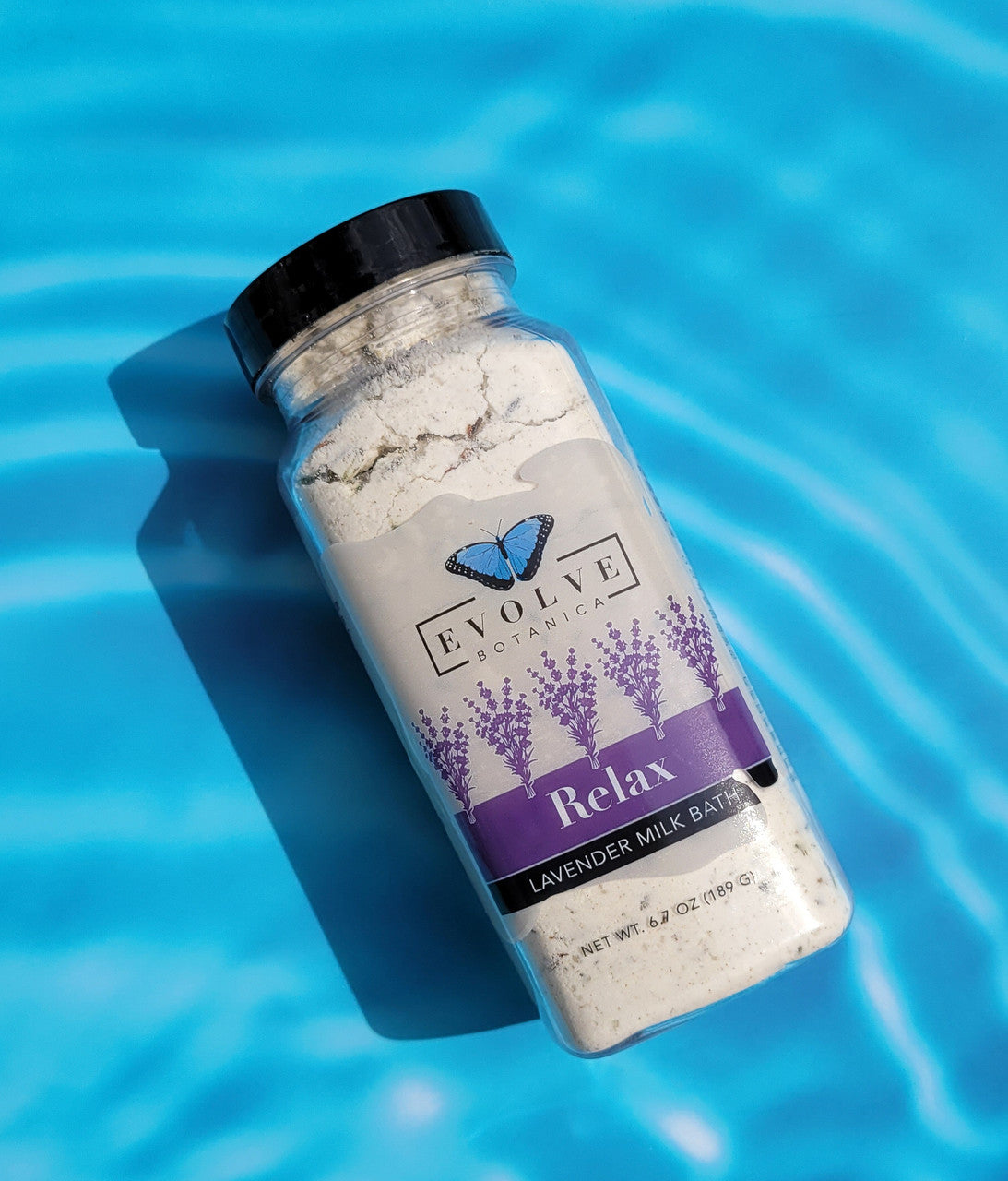 Evolve Botanica Lavender Milk Bath Relax with creamy milk and dried lavender flowers in a clear jar