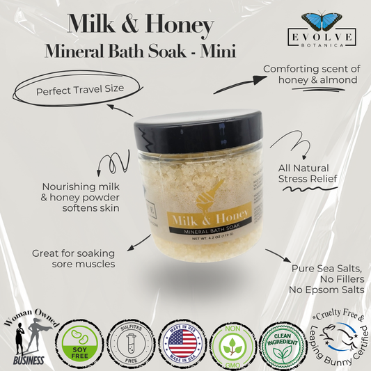 Mini Evolve Botanica Milk & Honey Mineral Bath Salt soak in a jar with a natural, soothing appearance and soft, creamy color.