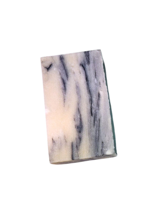 Evolve Botanica Seasonal Soap - 50 Shades with natural ingredients, showcasing a colorful, handcrafted soap bar.