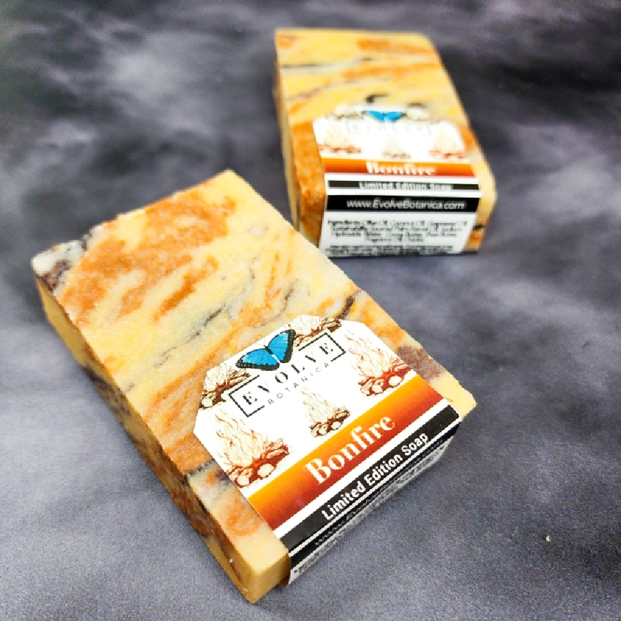 Evolve Botanica seasonal soap with bonfire Christmas scent, featuring festive packaging and warm, inviting appearance