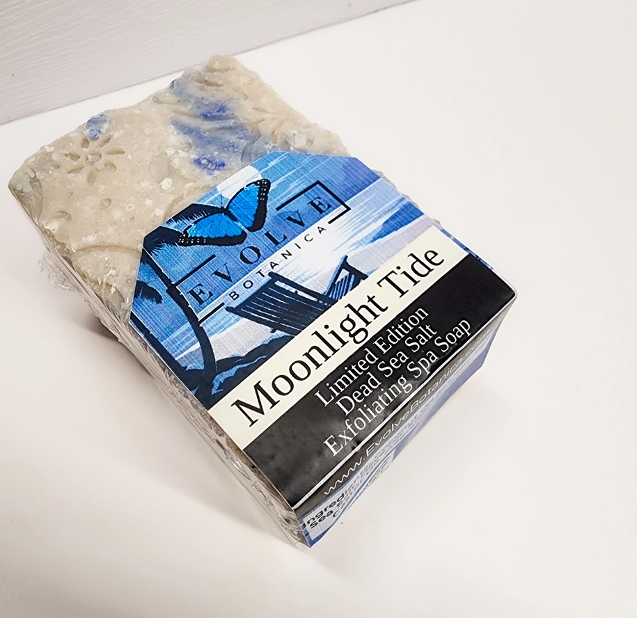Evolve Botanica Moonlight Tide Specialty Salt Bar soap with a luxurious, textured surface and elegant packaging.