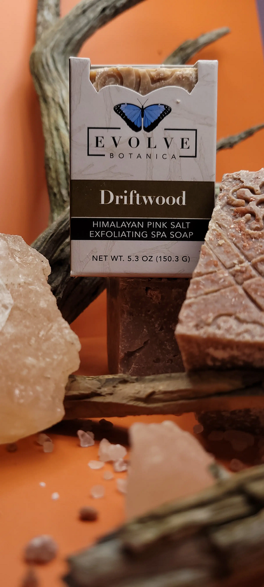 Evolve Botanica Driftwood Salt Bar specialty soap in unprinted glassine bag, showing natural, textured soap with driftwood scent.