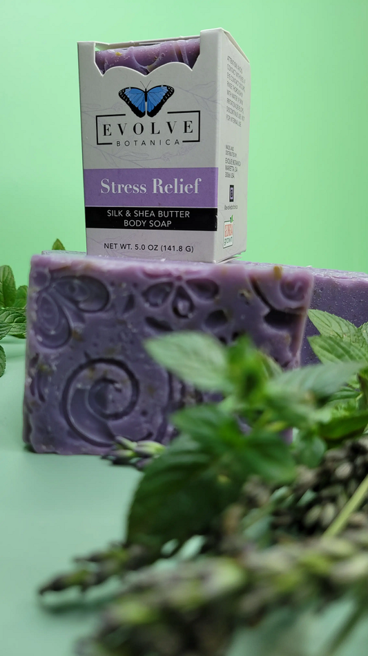 Evolve Botanica Stress Relief Silk Specialty Soap wrapped in unprinted glassine bag, highlighting natural soap texture and packaging.