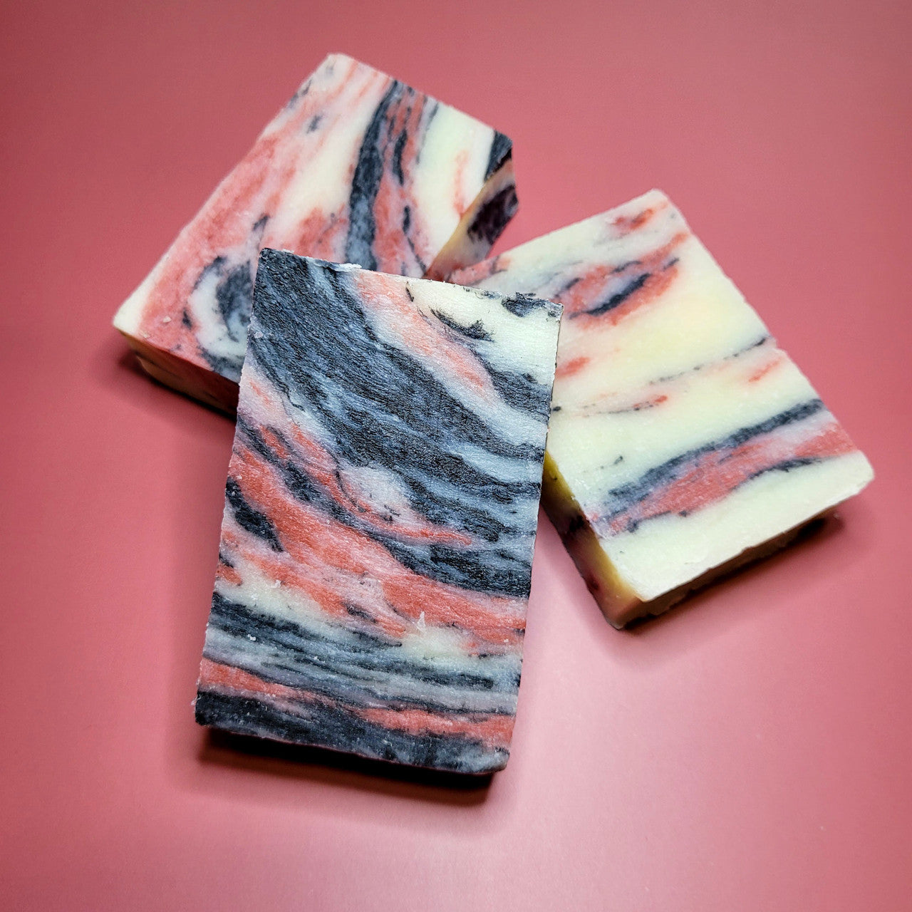 Evolve Botanica standard soap with apples and oak scent, wrapped in unprinted glassine bag for shipping.