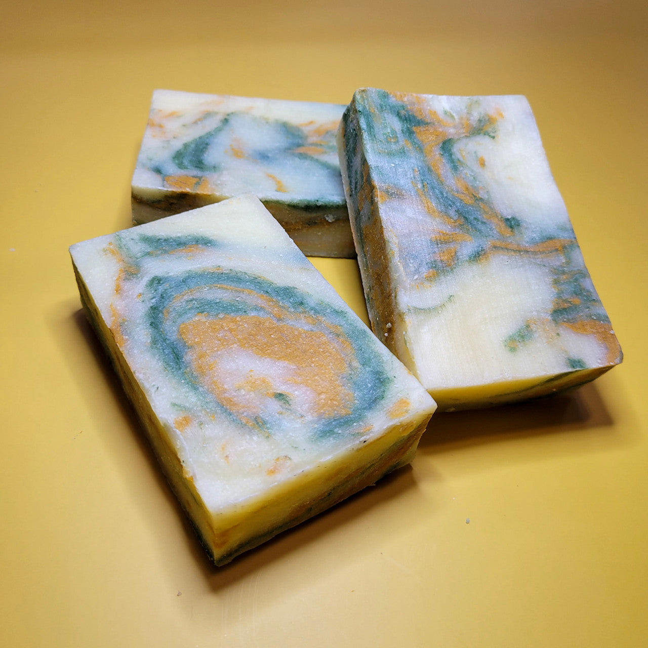 Evolve Botanica Lemongrass & Mint Standard Soap wrapped in unprinted glassine bag for shipping.