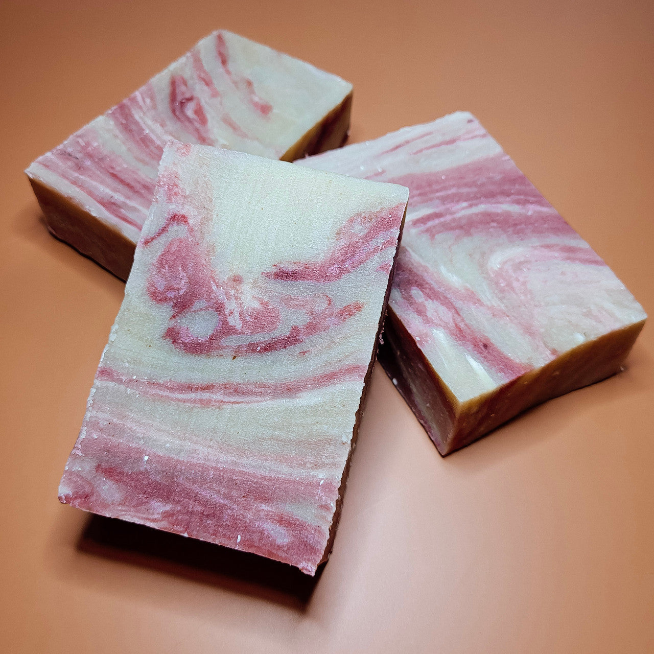 Evolve Botanica Peaches & Cream Goatmilk Standard Soap wrapped in unprinted glassine bag for shipping