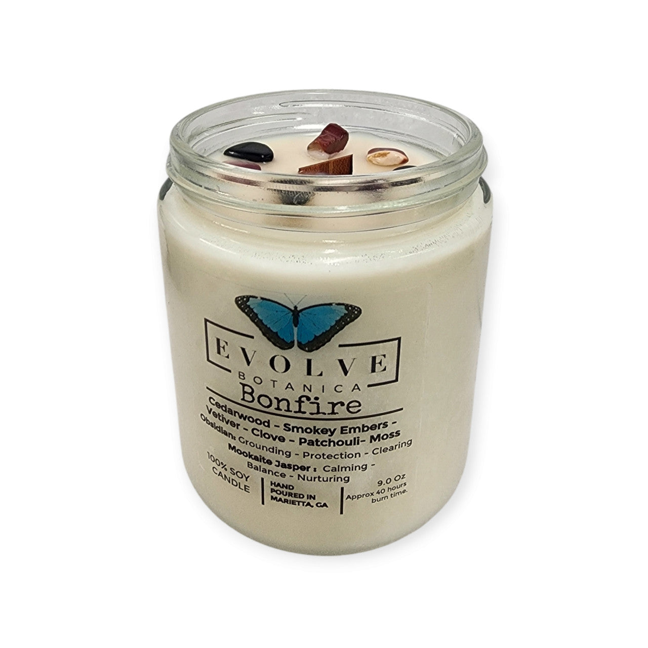 Evolve Botanica Classic 9oz Jam Jar Crystal Soy Candle with Obsidian and Mookaite stones, featuring a natural wood wick for a cozy bonfire scent.
