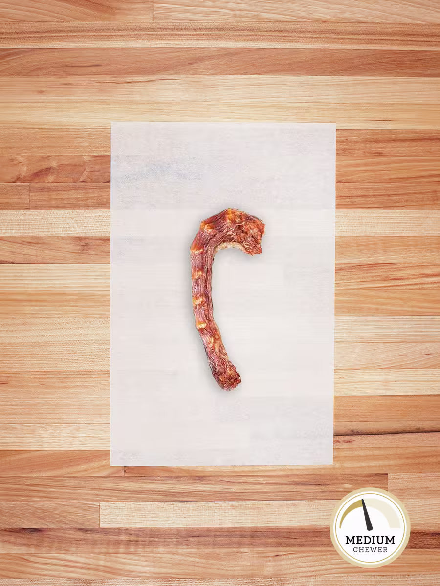 Farm Hounds chicken neck chews for dogs, natural and healthy pet treat with visible chicken neck pieces in the image.
