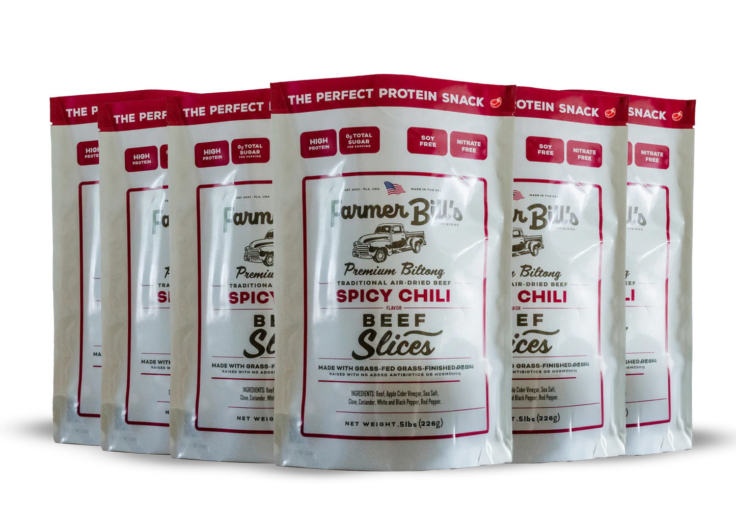 Five packs of Farmer Bill's Provisions 1/2 lb Sliced Chili Beef Biltong, a high-protein snack made with regenerative beef from South Dakota, are arranged in a staggered row with white packaging and red accents against a white background.