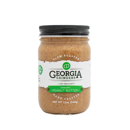 Georgia Grinders 64oz creamy peanut butter tub, smooth nut butter in a large plastic container.