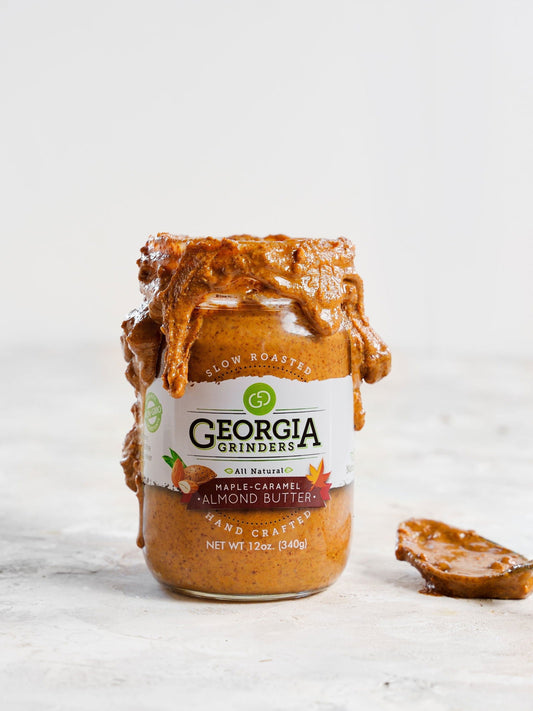 Georgia Grinders Maple Caramel Almond Butter in a 64 oz bulk tub, creamy nut butter with almond, maple, and caramel flavors.