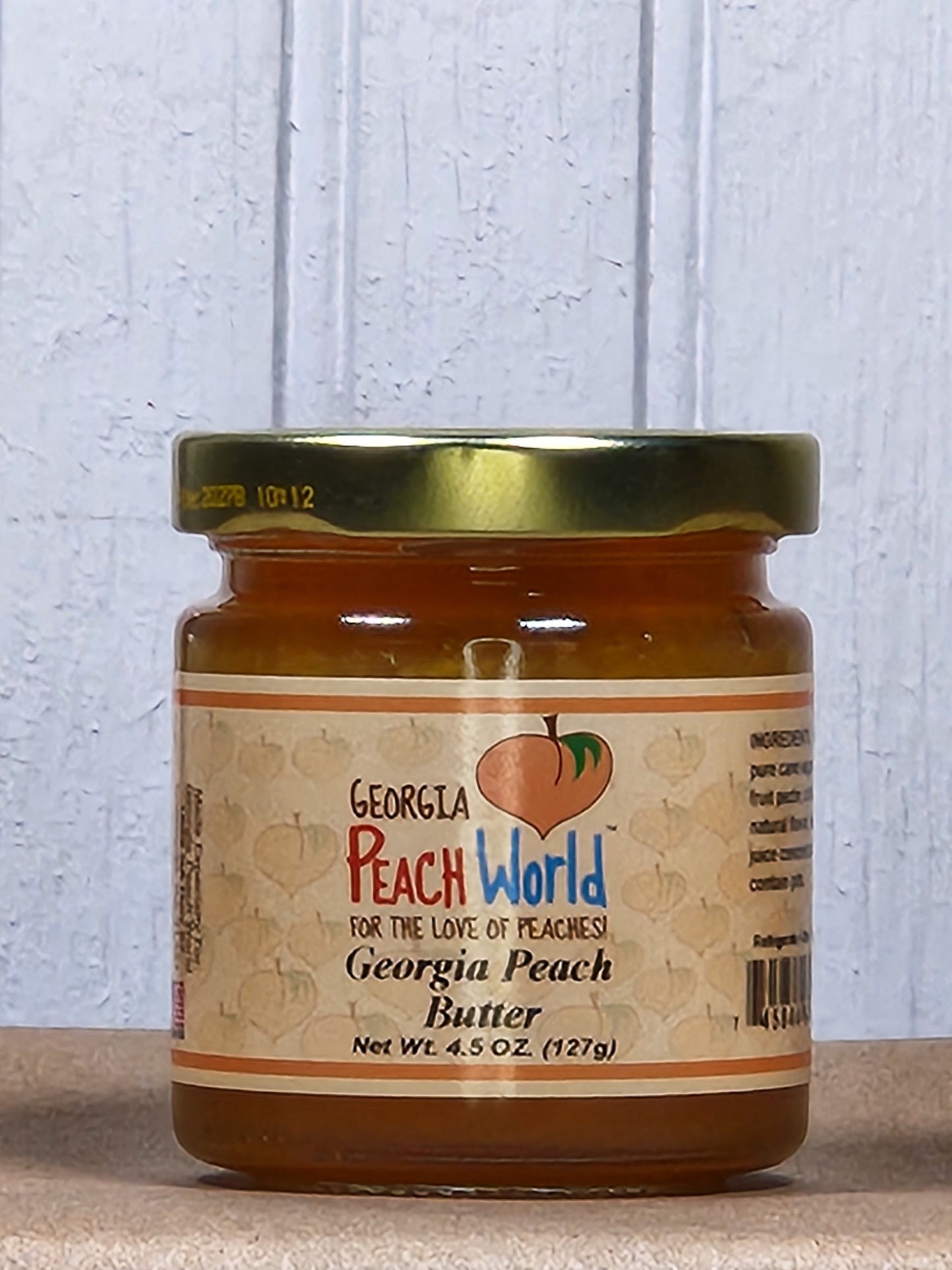 Georgia Peach World Peach Butter 5 oz jar, creamy and smooth spread made from fresh Georgia peaches.