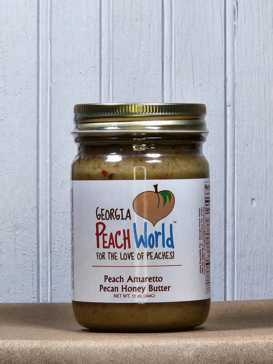 Georgia Peach World pecan honey butter in various flavors, creamy spread with pecans and honey visible in the jar