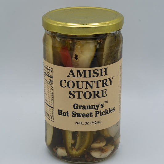 Canned Granny's Hot Sweet Pickles in 24oz jar from Amish Country Store, showing the label and bright pickles inside.