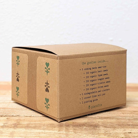 Herb seeds kit by Plantflix for growing cooking herbs in your garden, includes various herb seed packets and planting instructions.