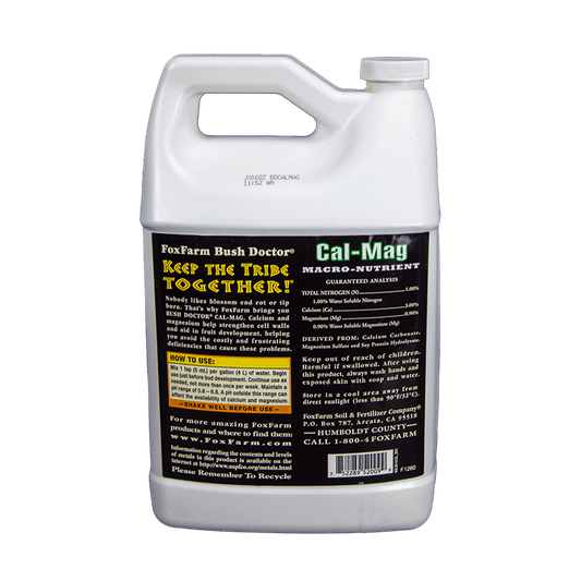 Grow Organic FoxFarm Cal-Mag fertilizer bottle, 1-gallon size, with label showing nutrient details and branding.