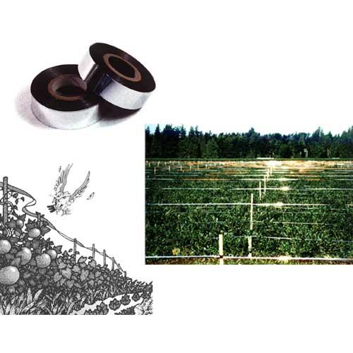 Red and silver Grow Organic bird scare tape on a roll, used for pest control to deter birds from gardens or crops.