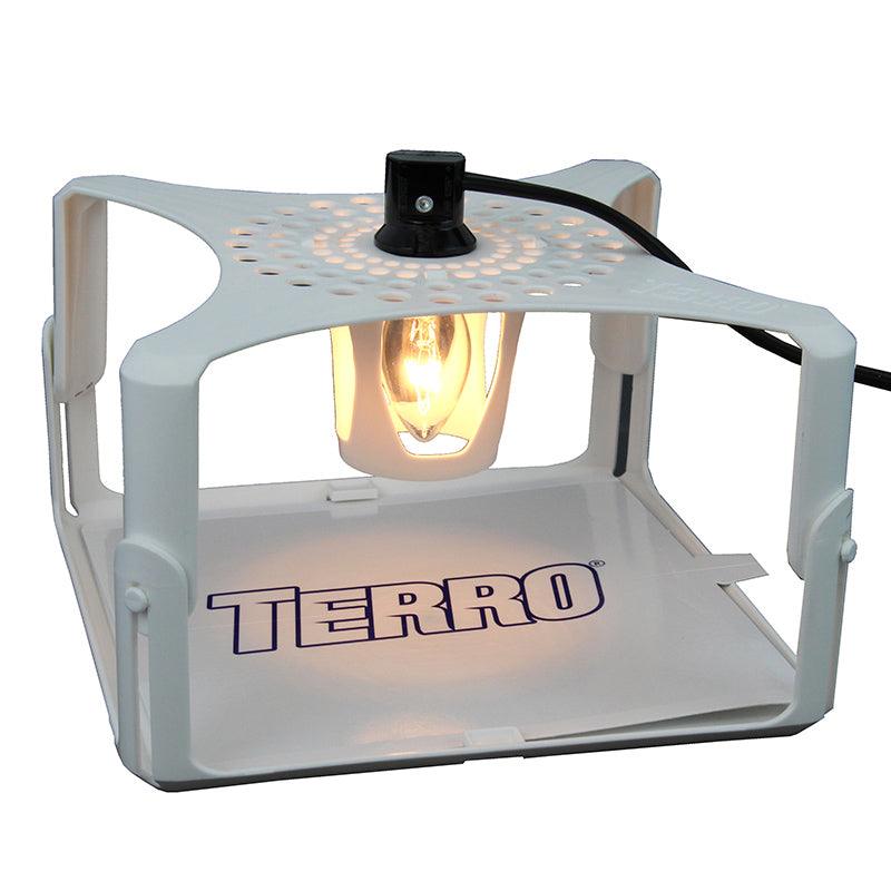 Grow Organic Terro Flea Trap for pest control, featuring a trap with sticky surface and attractant for fleas.