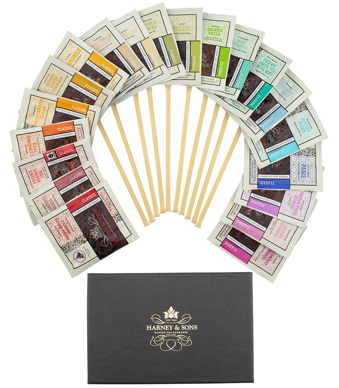Assorted wrapped tea sachets and honey sampler from Harney & Sons Fine Teas in a display arrangement.