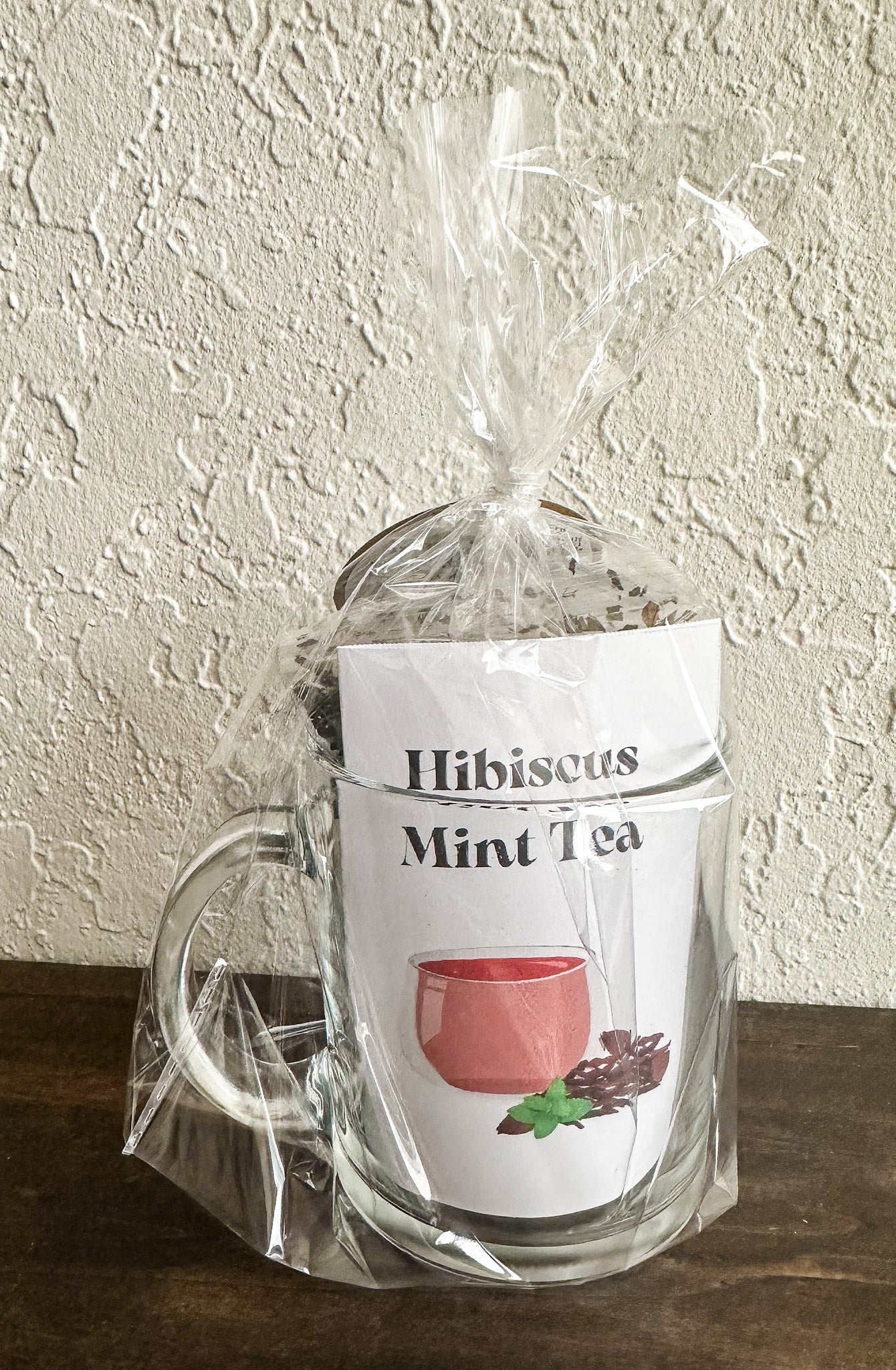 Herbalroseapothecary Hibiscus Mint Tea gift set with herbal tea bags and packaging, featuring vibrant hibiscus and mint ingredients.