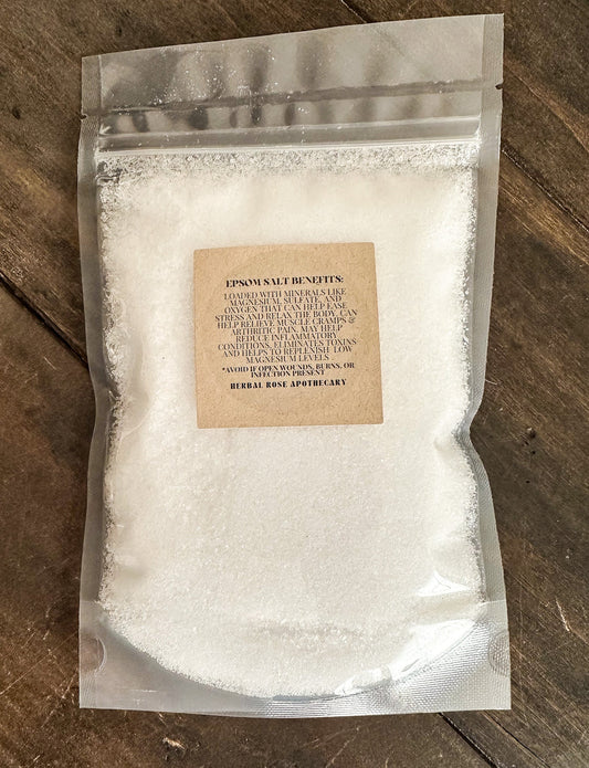 Herbalroseapothecary Epsom Salt in a jar, part of salts and oats collection, showcasing white crystalline Epsom salts for soothing baths.