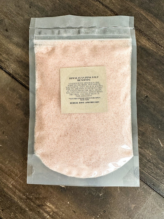 Himalayan Pink Salt from HerbalRoseApothecary, displayed with salts and oats in a natural setting.