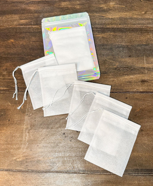 Herbalroseapothecary tea bag set with five assorted herbal tea bags in biodegradable packaging.