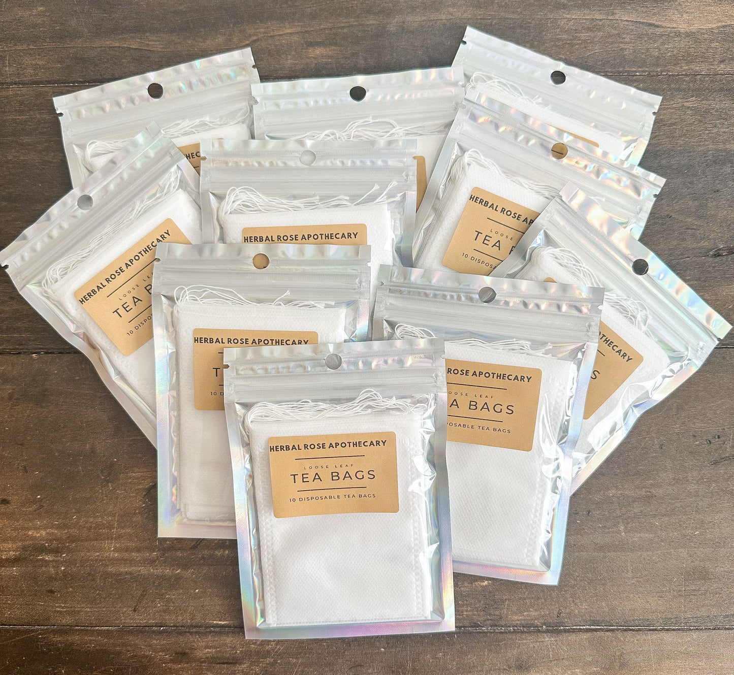 Herbalroseapothecary tea bag set with five assorted herbal tea bags in individually wrapped pouches.