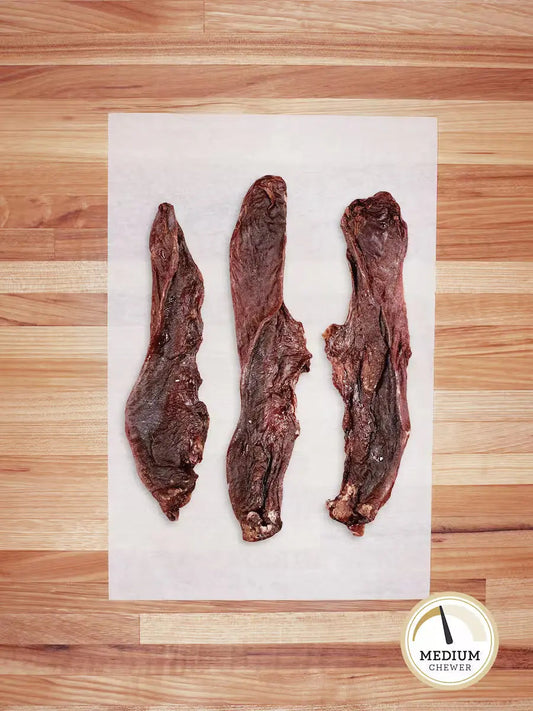 Farm Hounds hog tongue chews for dogs, showing a group of natural, tasty dog treats made from pig tongue.
