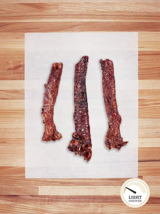 Farm Hounds hog trachea chews shown in a group, showcasing natural, air-dried pig trachea dog treats for healthy chewing.