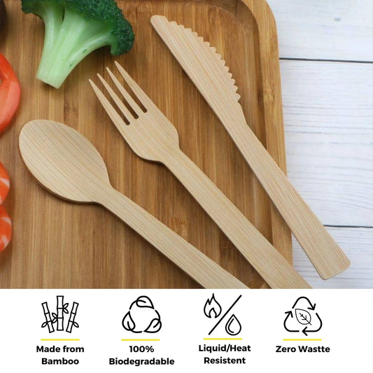 Six 6.7-inch bamboo knives from Holy City Straw Company, disposable cutlery set on a white background.