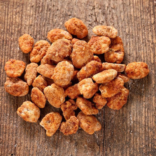 Two ounces of Sweet Georgia Heat sweet and spicy pecans from Horne Pecan Company, coated with a flavorful glaze.