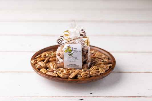 Small gift snack featuring assorted Horne Pecan Company candies in colorful packaging, perfect for gifting or snacking.