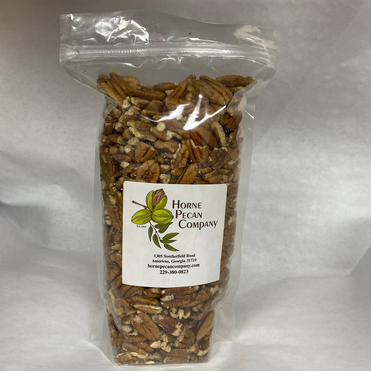 Bulk pecans from Horne Pecan Company, 2lb, 4lb, or 30lb, showing whole pecan halves in a natural nut and seed product image.