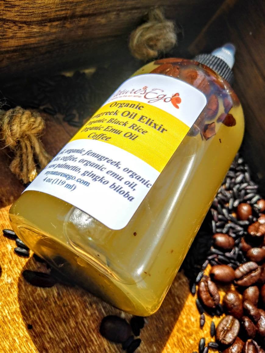 NaturesEgo Organic Fenugreek Hair Oil Elixir with black rice, emu oil, and coffee for nourishing hair treatment.