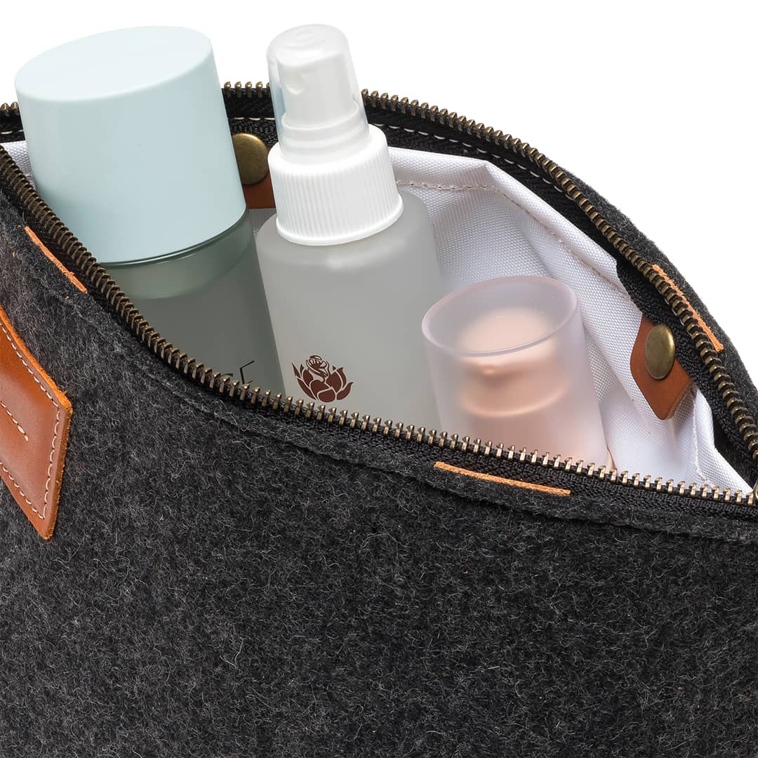 Gray felt and leather Kyrgies travel kit wallet with multiple compartments, compact and stylish for organizing essentials.