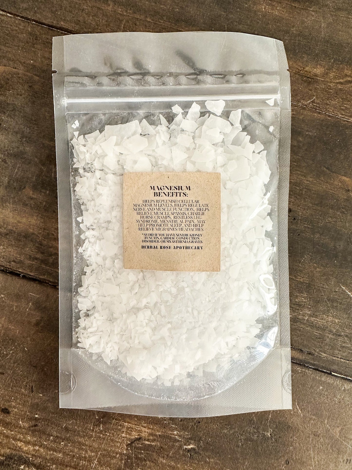 Herbalroseapothecary magnesium flakes salts and oats package with label showing ingredients and product details.
