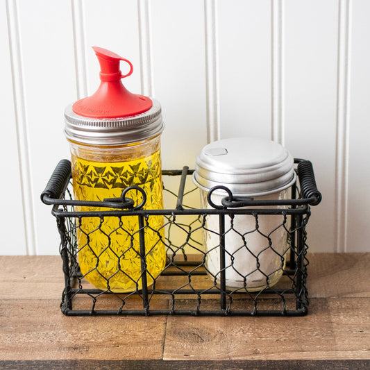 Chicken wire caddy holding two 8oz half-pint Mason jars from Mason Jar Lifestyle, with a rustic wire design.