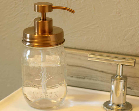 Rose gold soap pump lid kit for regular mouth Mason jars by Mason Jar Lifestyle, featuring a sleek, stylish soap dispenser lid.