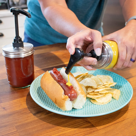 Food grade dispenser pump attached to a regular mouth matte stainless steel lid on a Mason Jar Lifestyle mason jar.