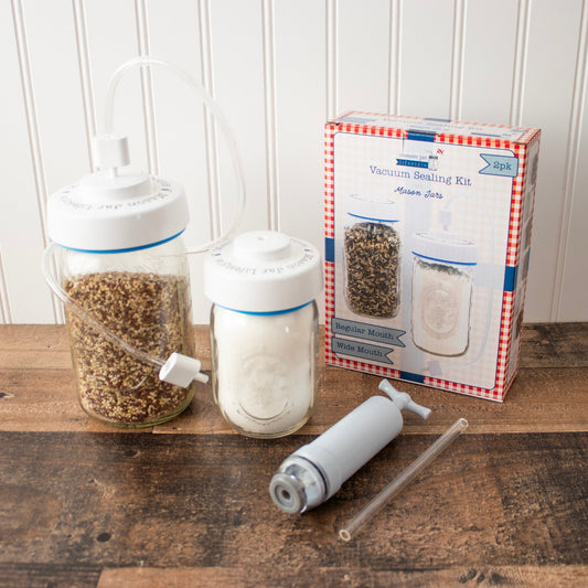 Mason Jar Lifestyle vacuum sealing kit with hand pump for regular and wide mouth mason jars, including sealing accessories.