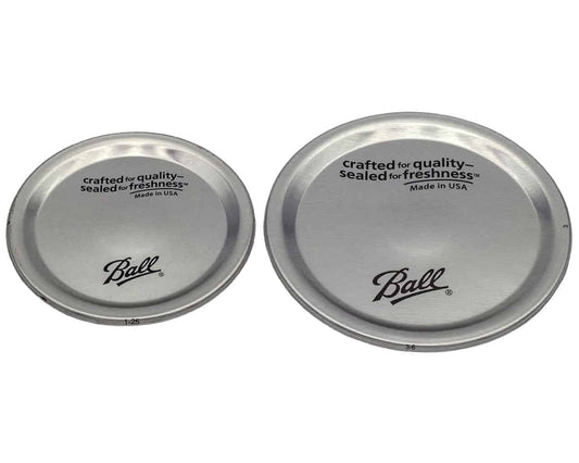 Wide-mouth Mason Jar Lids for canning and preserving, 12-pack by Mason Jar Lifestyle, shown with jars for sealing and storage.