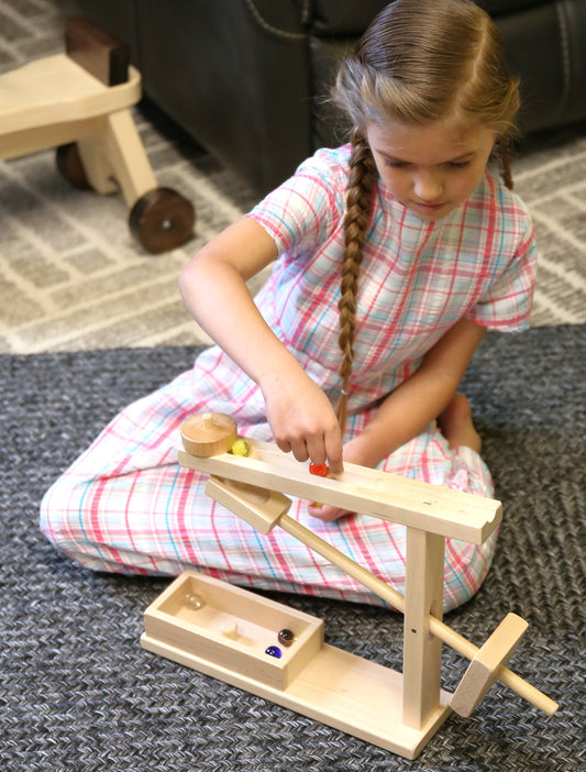 Amish-made wooden marble roller machine toy with child-safe maple and walnut finish, featuring colorful marbles and rolling balls.