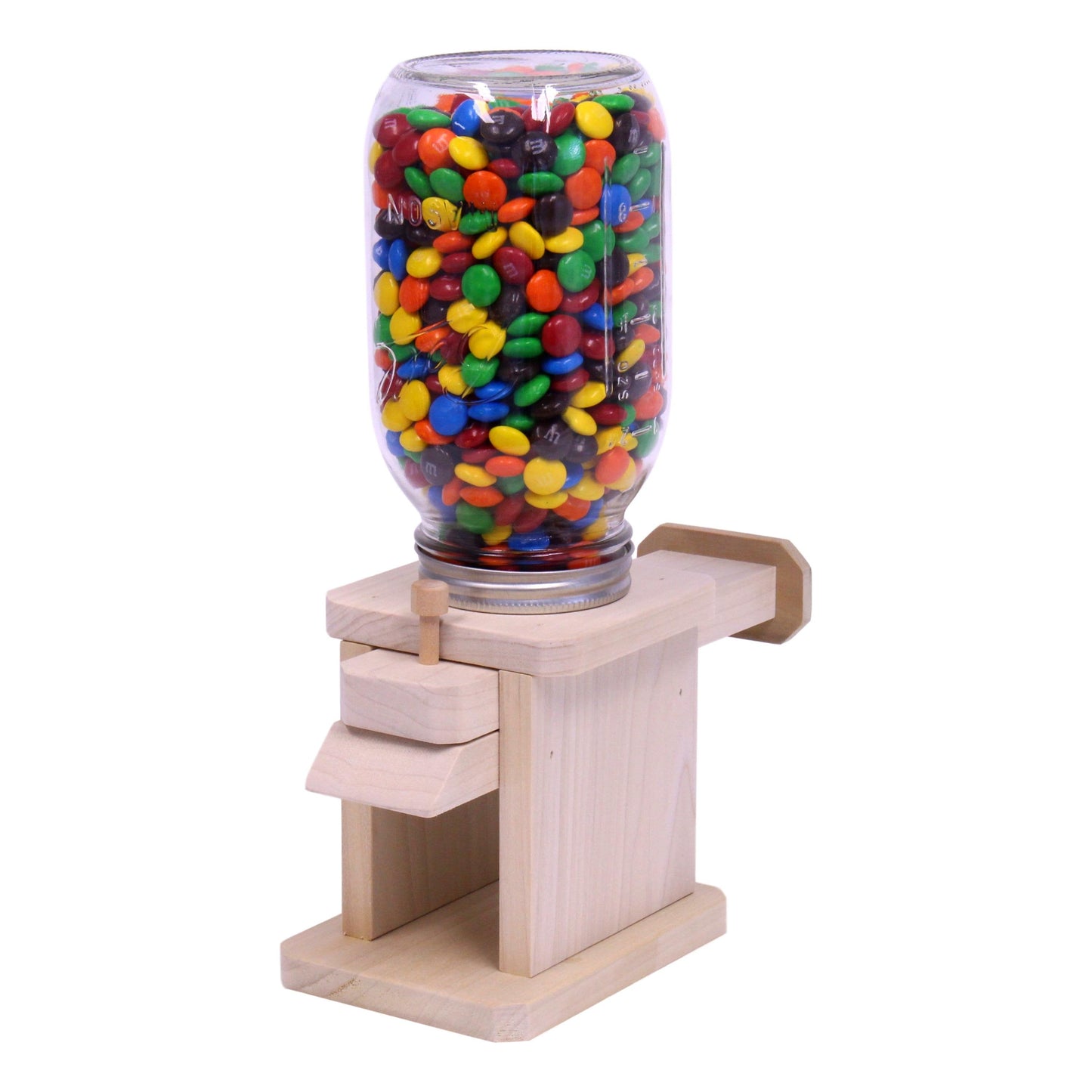 Toy jar candy dispenser from AmishToyBox.com, designed for M&Ms, peanuts, or jelly beans, featuring a clear plastic container with a dispensing spout.