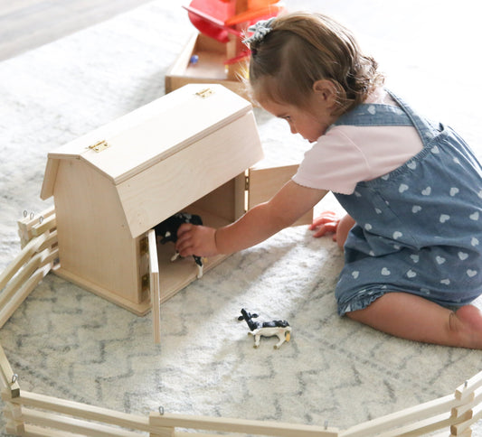AmishMade wooden mini barn toy with hip roof design, perfect for children’s play and educational fun.