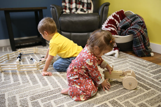 Amish-made wooden toy tractor with hitch from AmishToyBox.com, unfinished farm toy for children, crafted from natural wood.